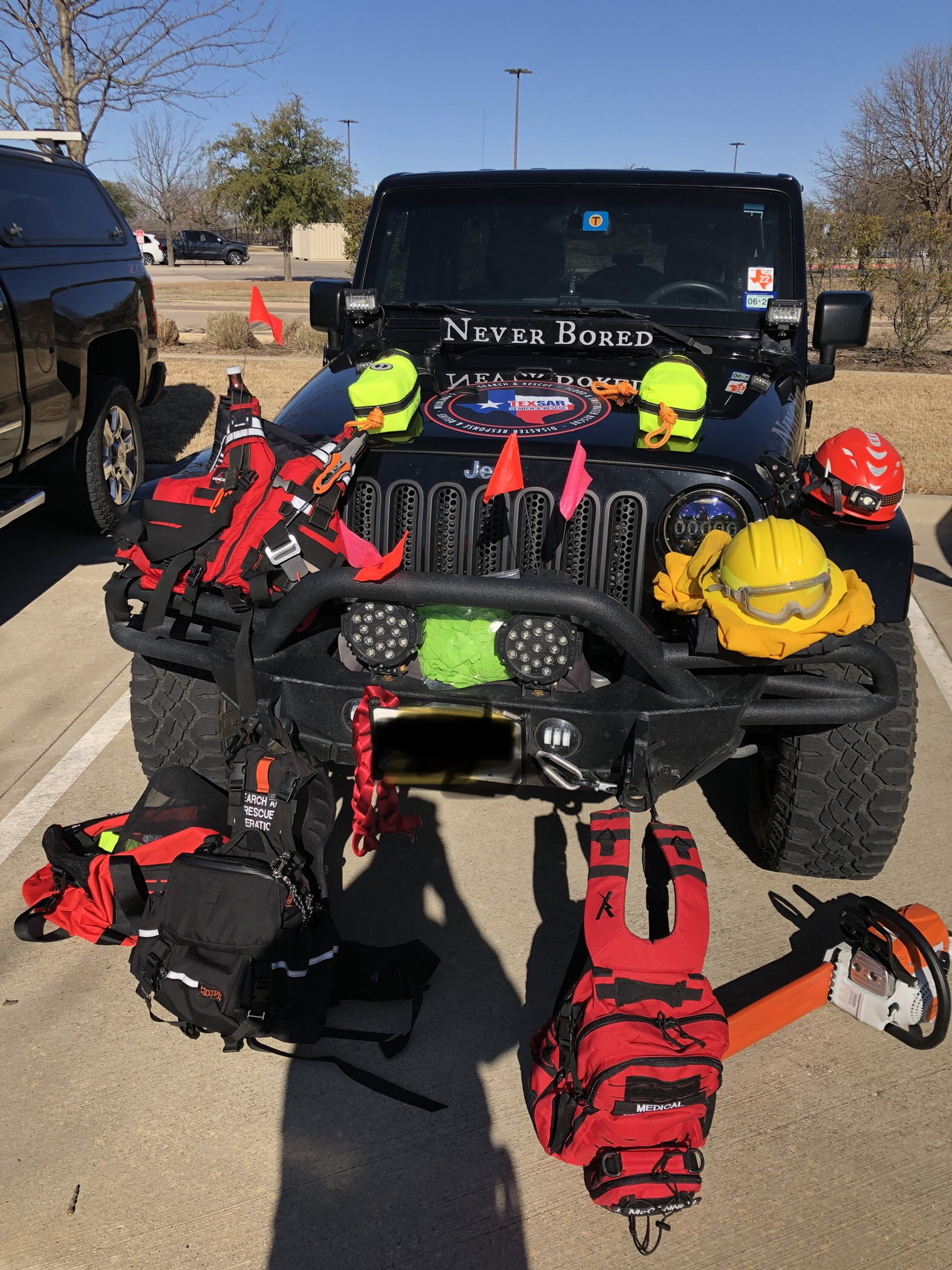 Jeep with first responder gear containing gear for security, safety, and medical response