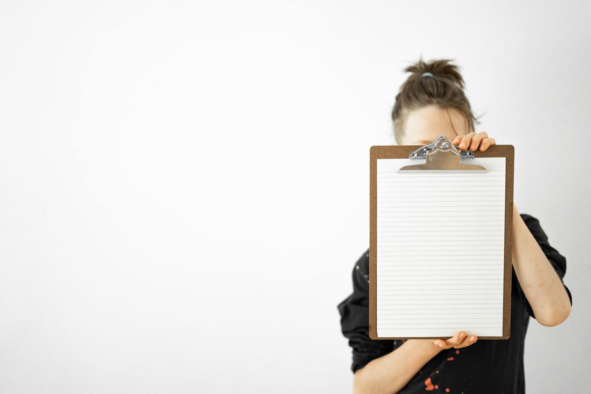Person reviewing documents — church background check and volunteer screening
