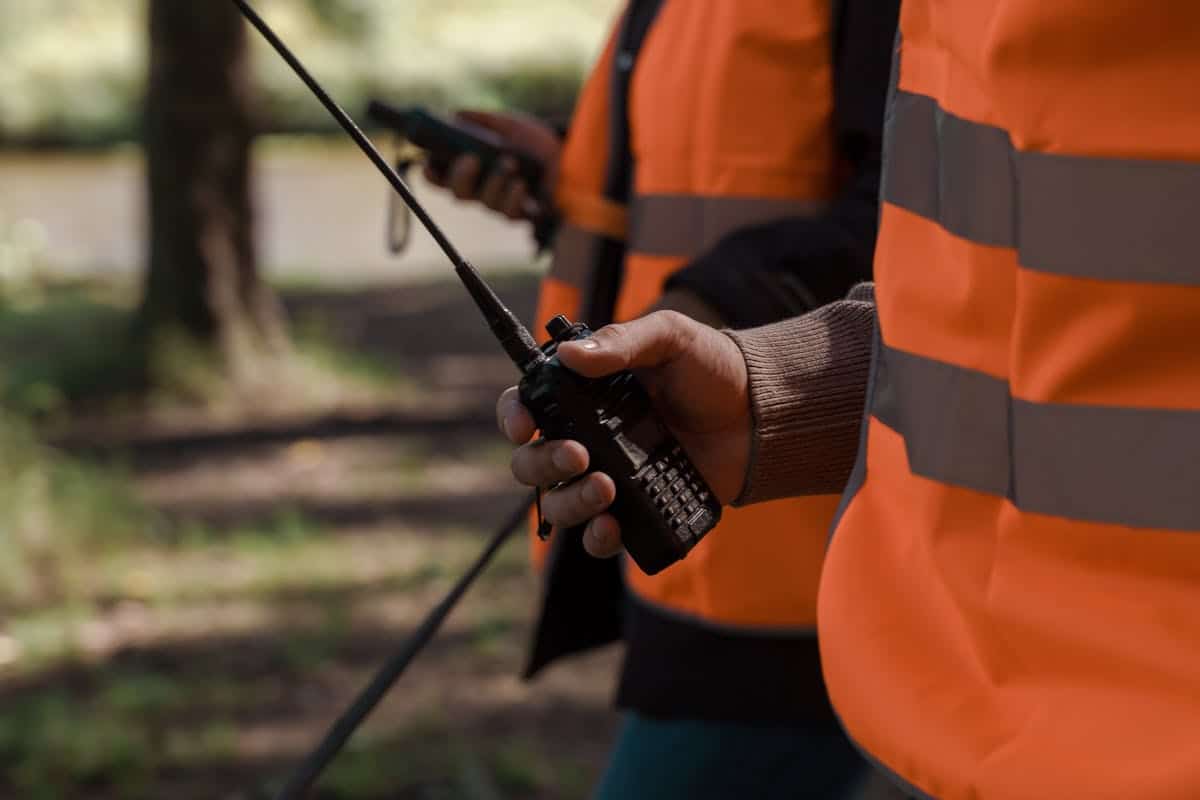 Rescue team using walkie talkies — cell phone app vs radio communication